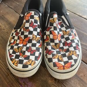 Vans Black and White Checkerboard Slip-On Sneakers